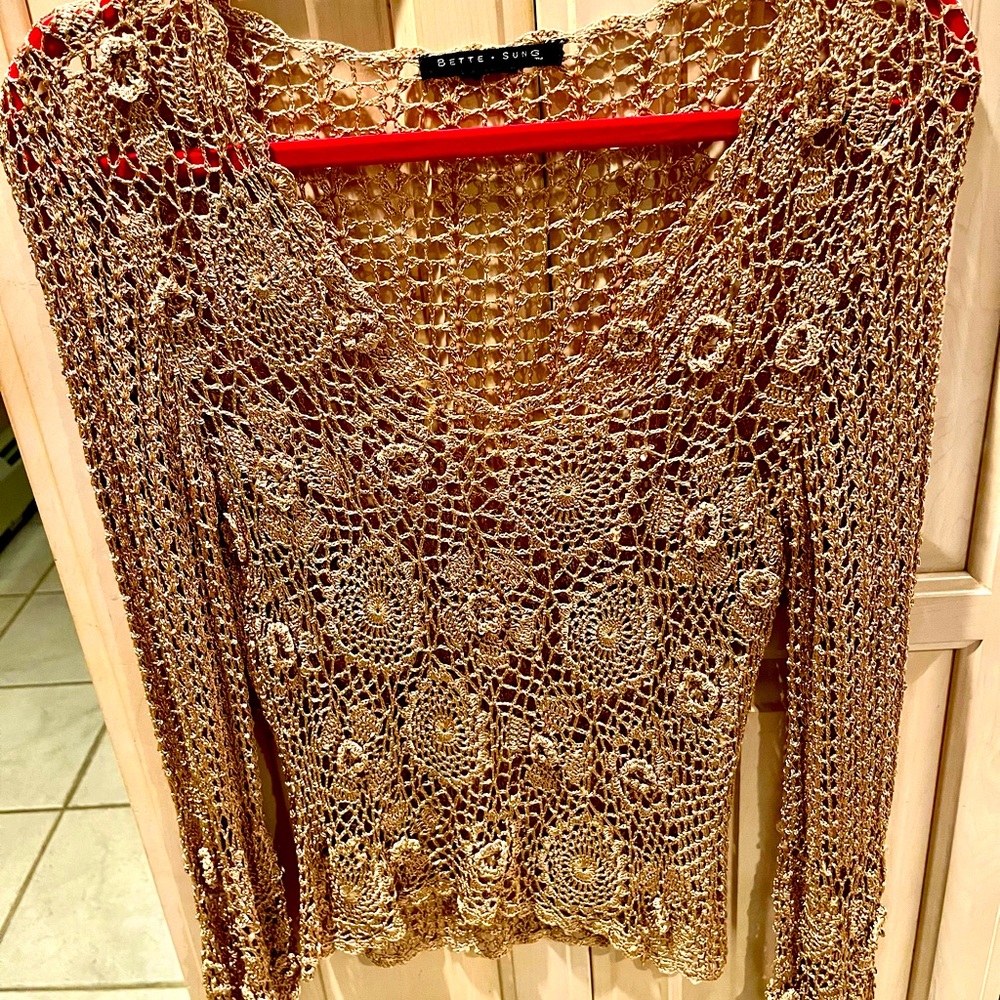 Beautiful layering, lace crocheted top.